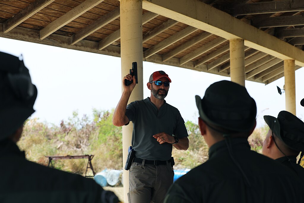 1024px-FBI_conducts_pistol_marksmanship_training_with_Columbia,_Dominican_Republic,_and_Guatemala_police_forces_at_TRADEWINDS_24_(8396889)