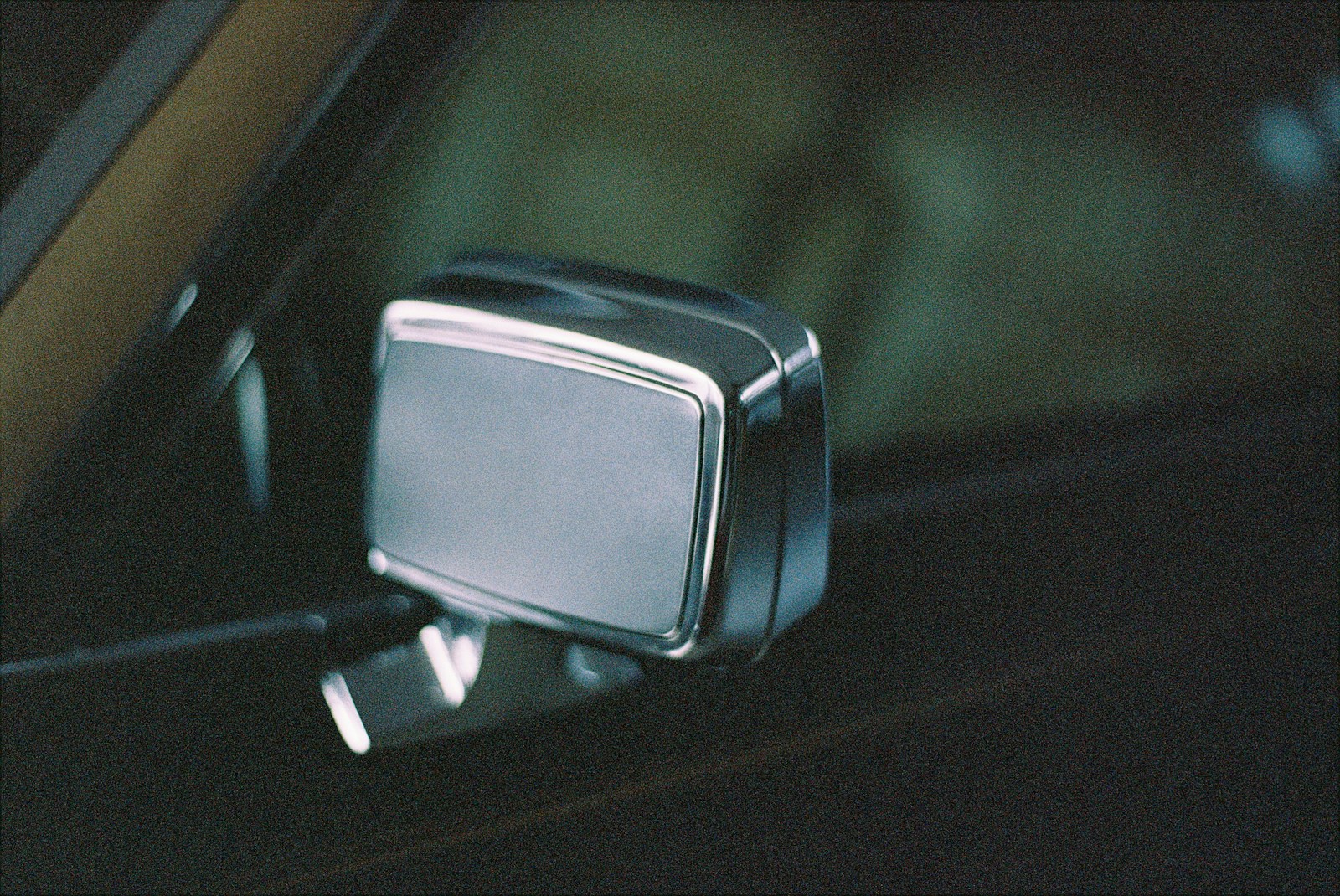black car side mirror during daytime